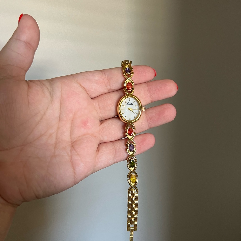 Elegant Gold Women's Watch with Multicolor Accents